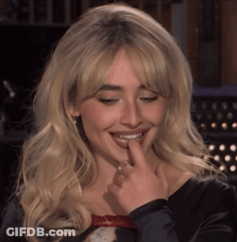 Woman With Blonde Hair And Ring GIF