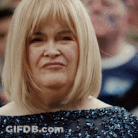 Woman With Blonde Hair In Blue Lace Dress GIF
