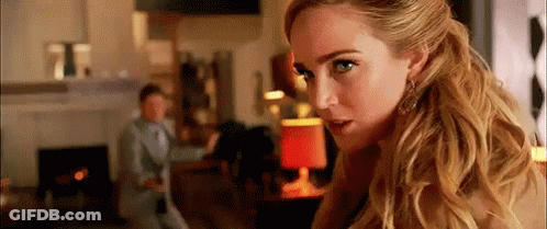 Woman With Blonde Hair In Living Room GIF