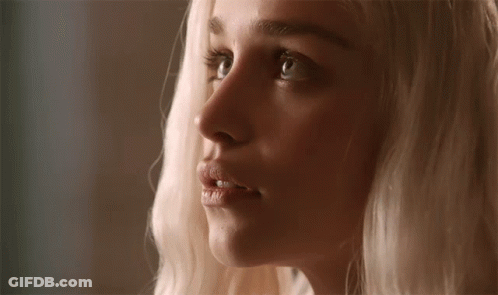 Woman With Blonde Hair Looking Sideways GIF