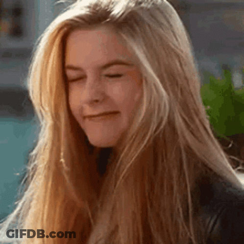 Woman With Blonde Hair Making Funny Face GIF