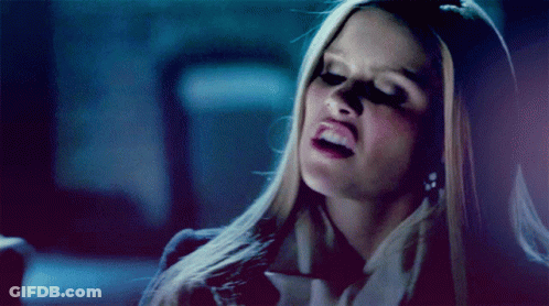 Woman With Blonde Hair Making Funny Face GIF