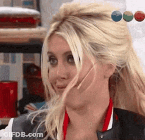 Woman With Blonde Hair Making Funny Face GIF