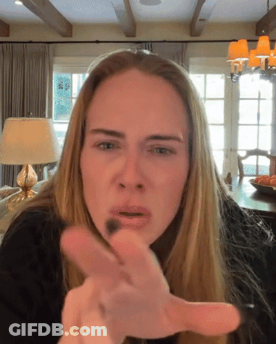 Woman With Blonde Hair Making Funny Face GIF