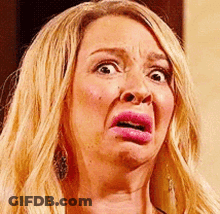 Woman With Blonde Hair Making Funny Face GIF