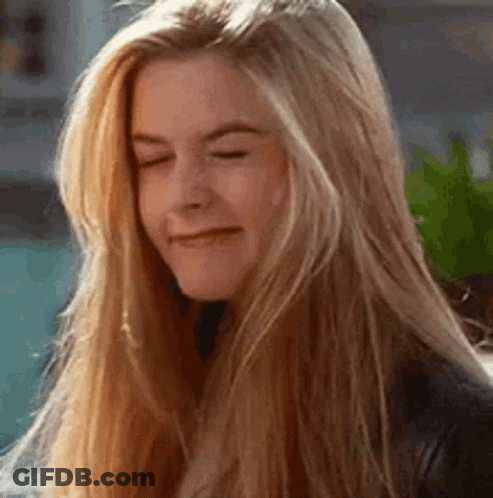 Woman With Blonde Hair Making Funny Face GIF