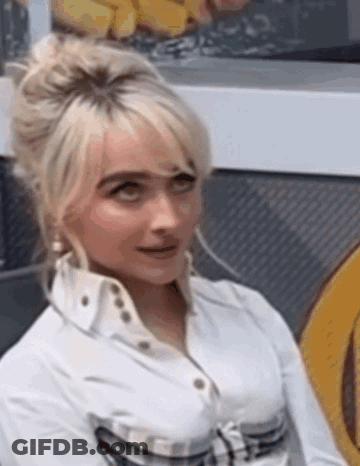 Woman With Blonde Hair Sitting GIF