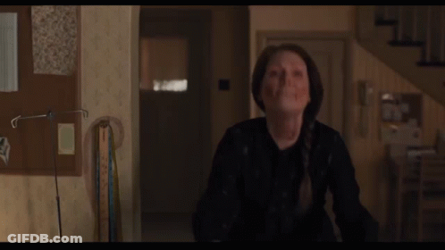 Woman With Blood On Face In Hallway GIF