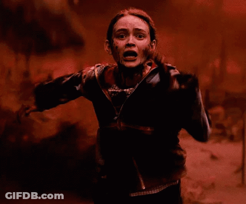 Woman With Blood On Face In Red Field GIF