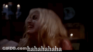 Woman With Blood On Face Laughing In Dark Room With Candles Hahahahaha GIF