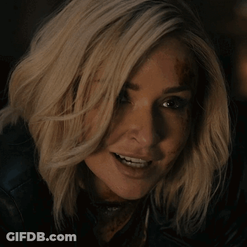 Woman With Blood On Face Smiling GIF