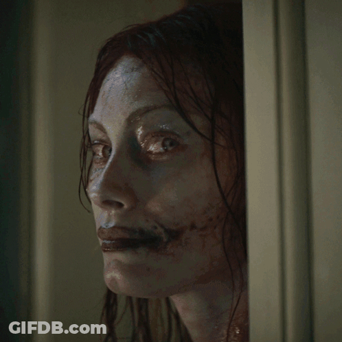 Woman With Blood On Face Smiling GIF