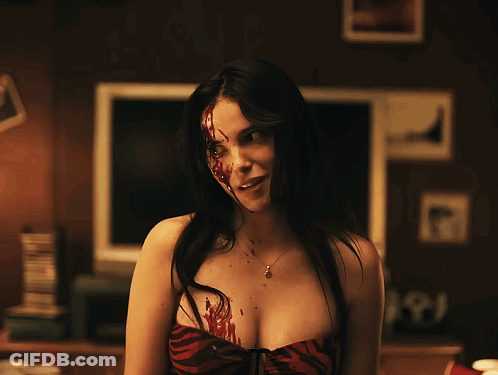 Woman With Blood On Face Standing GIF