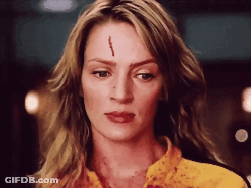 Woman With Bloody Spot On Forehead GIF