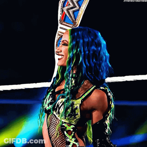 Woman With Blue And Green Hair Holding Wrestling Belt GIF