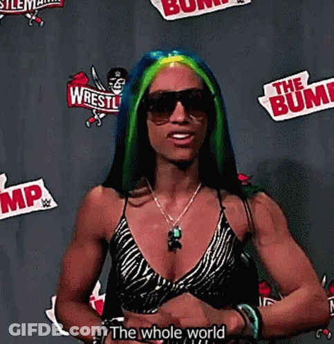 Woman With Blue And Green Hair In Front Of The Whole World GIF