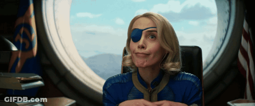 Woman With Blue Eye Patch Looking Out Window GIF