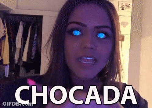 Woman With Blue Eyes And Chocada On Face GIF