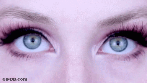 Woman With Blue Eyes And Long Eyelashes GIF