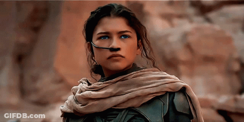 Woman With Blue Eyes And Scarf GIF
