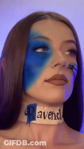 Woman With Blue Face Paint And Ravenclaw Choker GIF