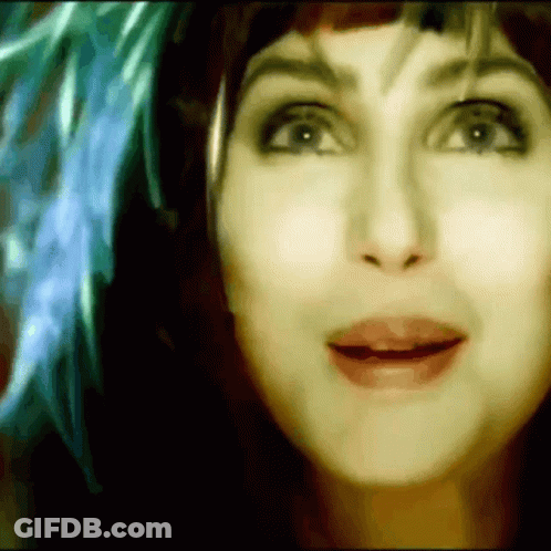 Woman With Blue Feather In Hair GIF