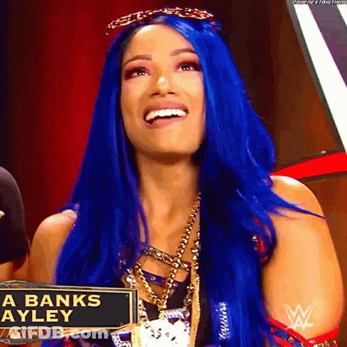 Woman With Blue Hair And Banks Ayley Sign GIF