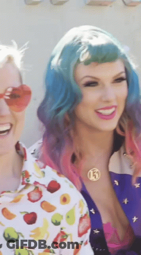 Woman With Blue Hair And Number 13 Necklace GIF
