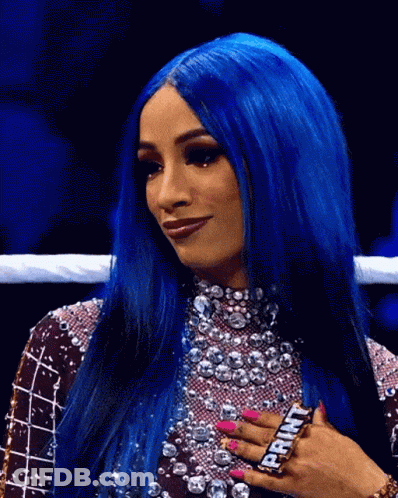 Woman With Blue Hair And Pink Nails Wearing Ring GIF