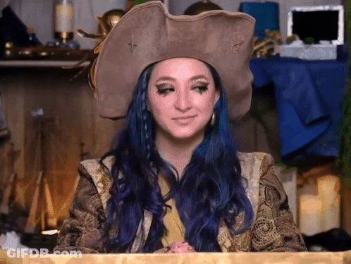 Woman With Blue Hair And Pirate Hat GIF