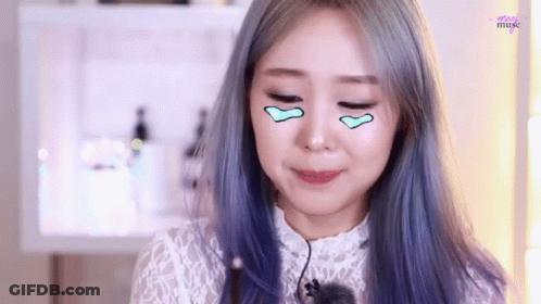 Woman With Blue Hair And White Lace Top With Microphone GIF