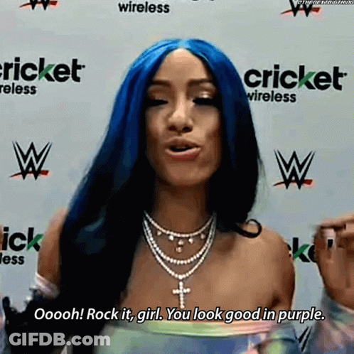 Woman With Blue Hair At Cricket Wireless Wall GIF