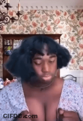 Woman With Blue Hair By Floral Wallpaper GIF