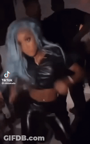 Woman With Blue Hair Dancing In Front Of Crowd GIF