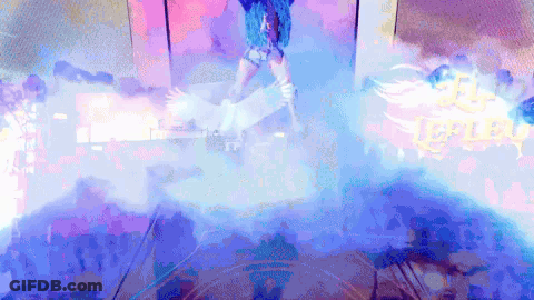 Woman With Blue Hair Dancing In Front Of Replay Sign GIF