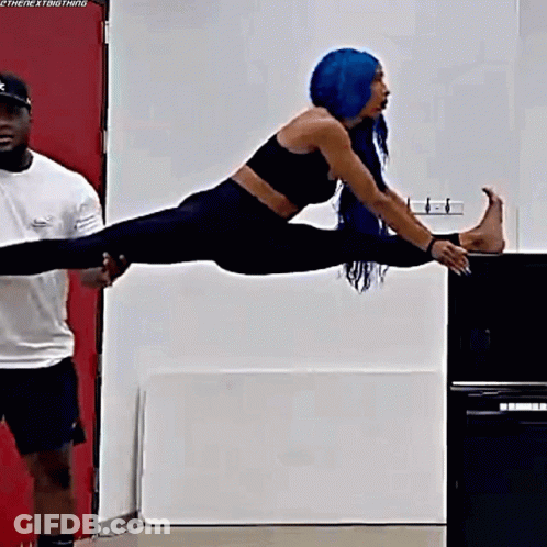 Woman With Blue Hair Doing Split GIF