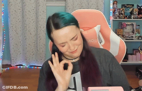 Woman With Blue Hair Giving Ok Sign GIF