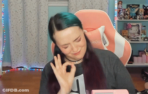 Woman With Blue Hair Giving Ok Sign GIF