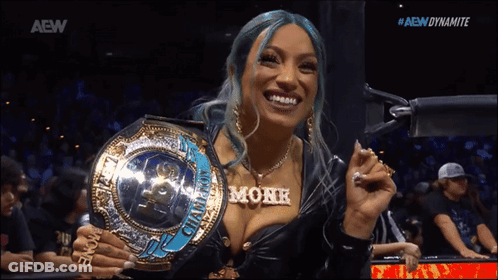 Woman With Blue Hair Holding Championship Belt GIF