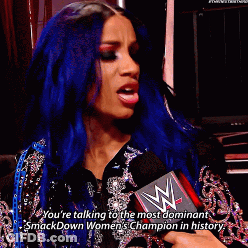 Woman With Blue Hair Holding Microphone Talking To Smackdown Champion GIF