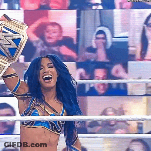 Woman With Blue Hair Holding Wrestling Championship Belt GIF
