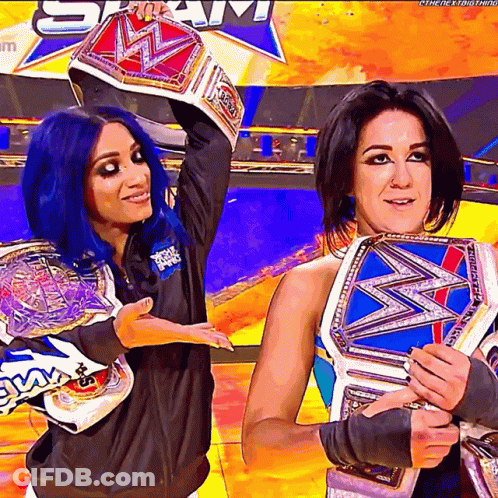 Woman With Blue Hair Holding Wrestling Championship GIF
