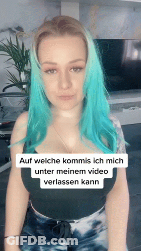 Woman With Blue Hair In Black Tank Top GIF