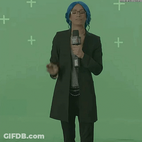 Woman With Blue Hair In Front Of Green Screen GIF
