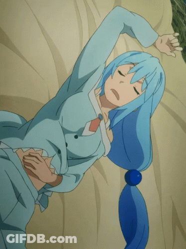 Woman With Blue Hair Laying On Bed Eyes Closed GIF