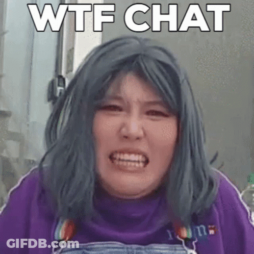 Woman With Blue Hair Making Funny Face In Purple Sweater GIF