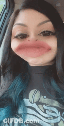 Woman With Blue Hair Making Funny Face GIF