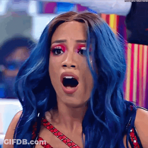 Woman With Blue Hair Making Funny Face GIF