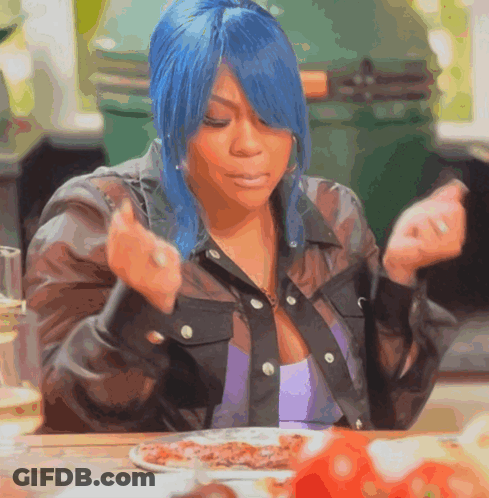 Woman With Blue Hair Sitting At Table With Food GIF