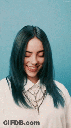Woman With Blue Hair Smiling With Eyes Closed In White Shirt GIF
